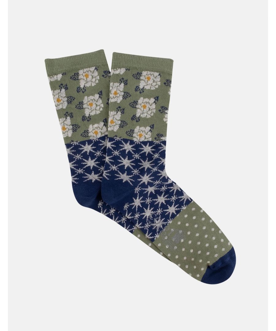 A stylish addition to your sock drawer, this striking pair feature an intricate patchwork of stars, spots and flowers, with a contrast toe and heel. Knitted with the finest cotton, they're exceptionally soft and silky. Made to a standard length, with a smooth toe seam, these socks offer comfort and style around the clock.  Sizes: Medium (UK 4-5.5), Large (UK 6-8).  75% cotton, 25% nylon (for added strength).  Made for British Boxers in Wales.