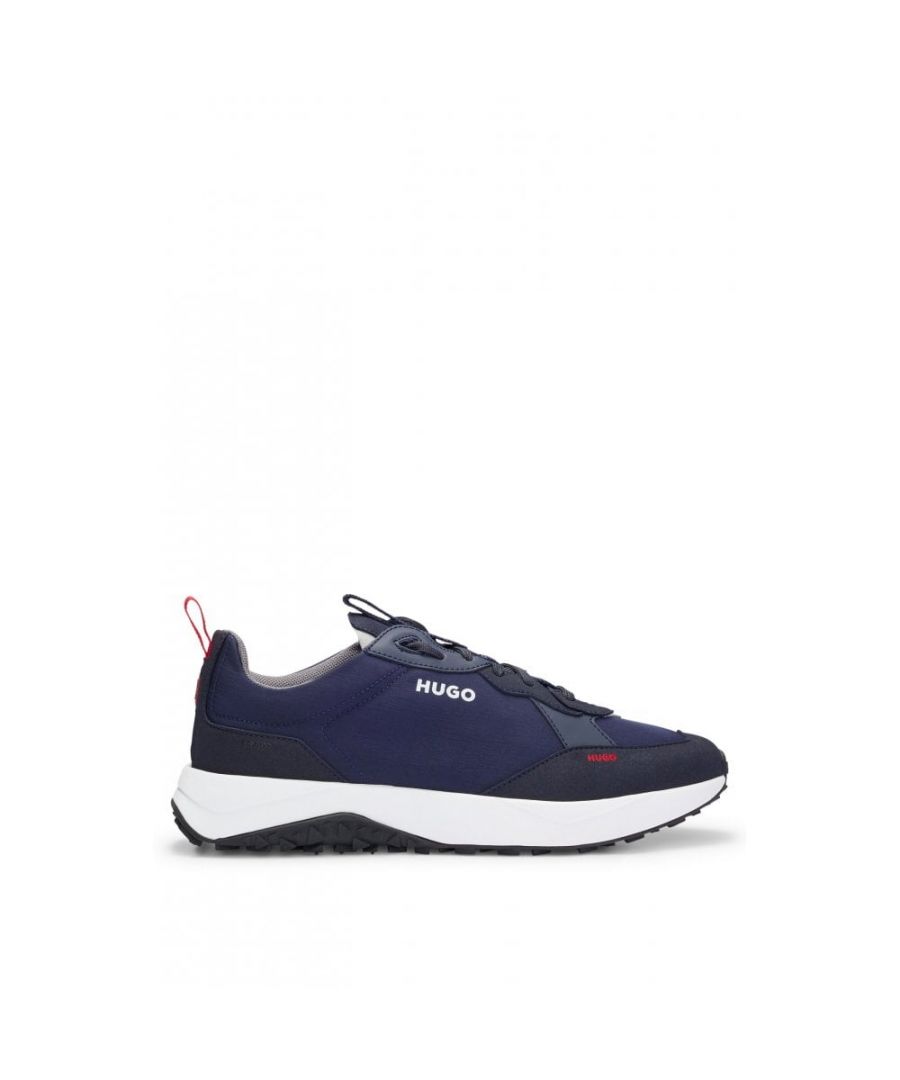 Sporty trainers by HUGO, crafted in smooth nylon with contrasting facings and an array of logo details for signature DNA.\nUpper material: 100% Polyamid, 100% Polyester, 60% Polyester, 40% Polyurethane, Sole: 80% Ethylene vinyl acetate, 20% Rubber, Facing: 100% Polyurethane, 60% Polyester, 40% Polyurethane, Innersole: 100% Polyester\n50493146