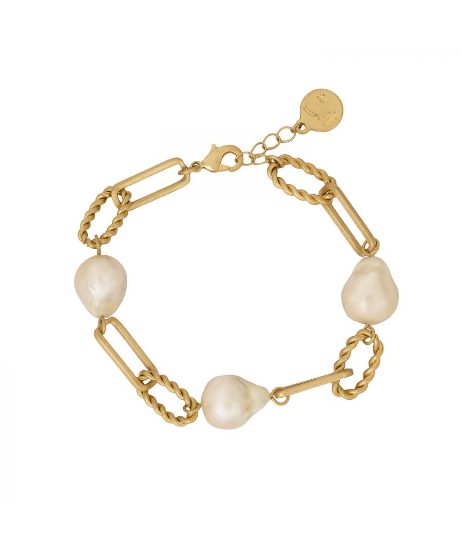 Add a hint of luxe to your look in our Kate Thornton Gold Opaline link chain bracelet. Featuring gorgeous real pearls that will add a simple yet elegant and striking arm candy statement. Easy to pair with a statement watch or an armful of bangles, the choices are endless! This gold tone bracelet is 7.5inches in length with a lobster clasp fastening and 2cm extender chain. Presented in a KTx jewellery pouch to keep your jewellery safe or ideal for gifting!