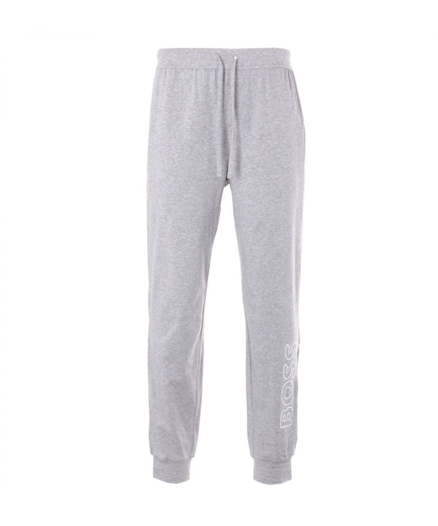 Refresh your sleepwear with the Identity Cuffed Pyjama Bottoms from BOSS. Perfect for downtime styling crafted from a super soft stretch cotton jersey, offering breathability and unmatched comfort. Featuring an elasticated drawstring waist, side seam pockets and elasticated cuffs. Finished with the brand new BOSS logo outlined and printed vertically down the left leg. Regular Fit, Stretch Cotton Jersey, Elasticated Drawstring Waist, Twin Side Seam Pockets, Elasticated Cuffs, BOSS Branding. Style & Fit:Regular Fit, Fits True to Size. Composition & Care:95% Cotton, 5% Elastane, Machine Wash.