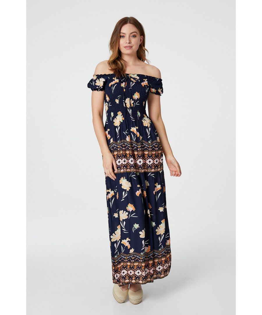 Add a statement making printed off the shoulder maxi dress to your closet with this floral print dress. With a bardot neckline, cap sleeves, a tie front, a shirred bodice, a full length straight skirt with a border print detail. Pair with flat strappy sandals for the ultimate comfortable daytime look or with nude espadrille wedges for a weekend wedding.