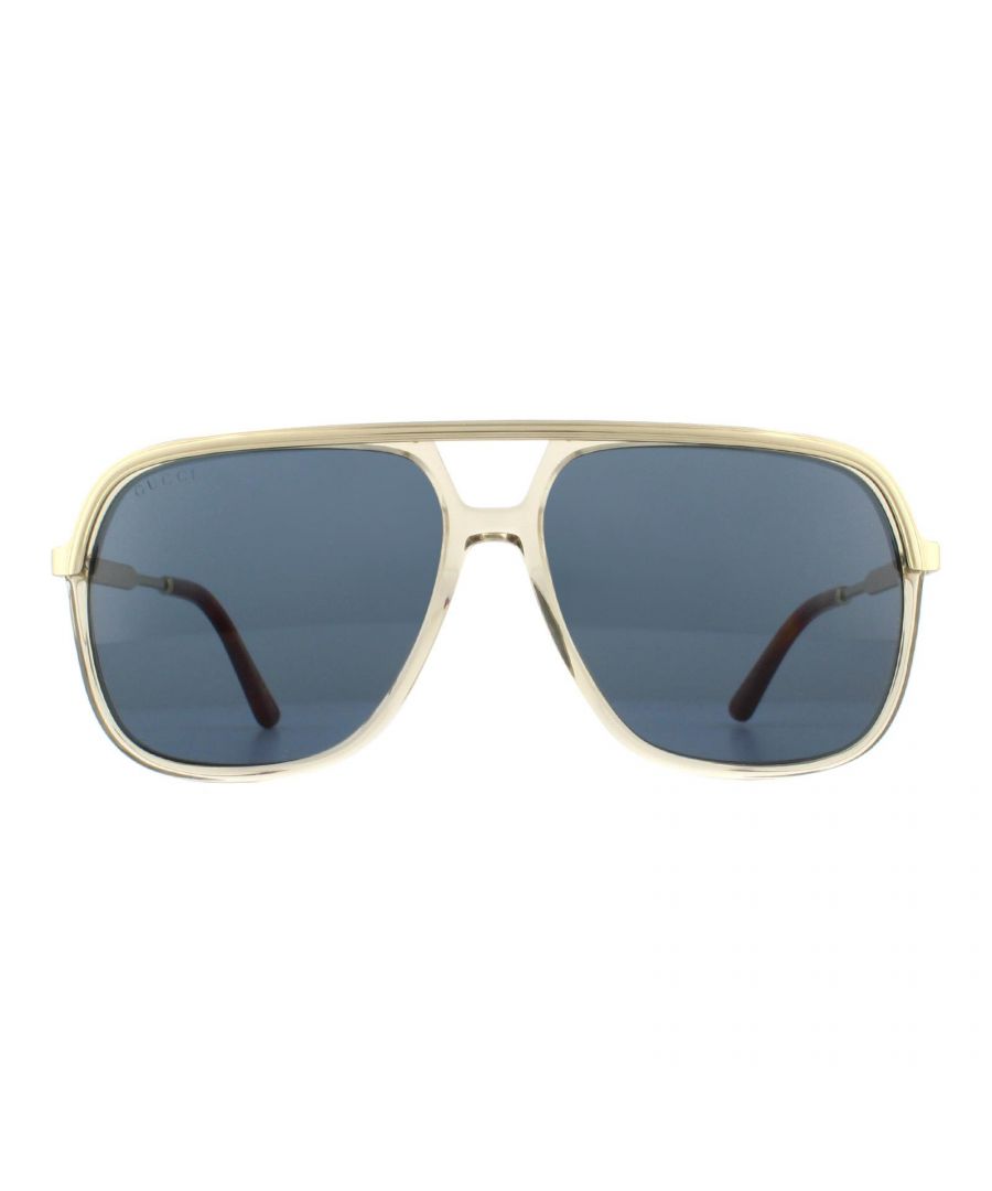 Gucci Sunglasses GG0200S 004 Gold with Light Brown Crystal Blue feature oversized square lenses and a double bridge. A blend of materials, the frame is made from metal and plastic, ensuring comfort. The GG0200S are bold and guaranteed to make a statement!