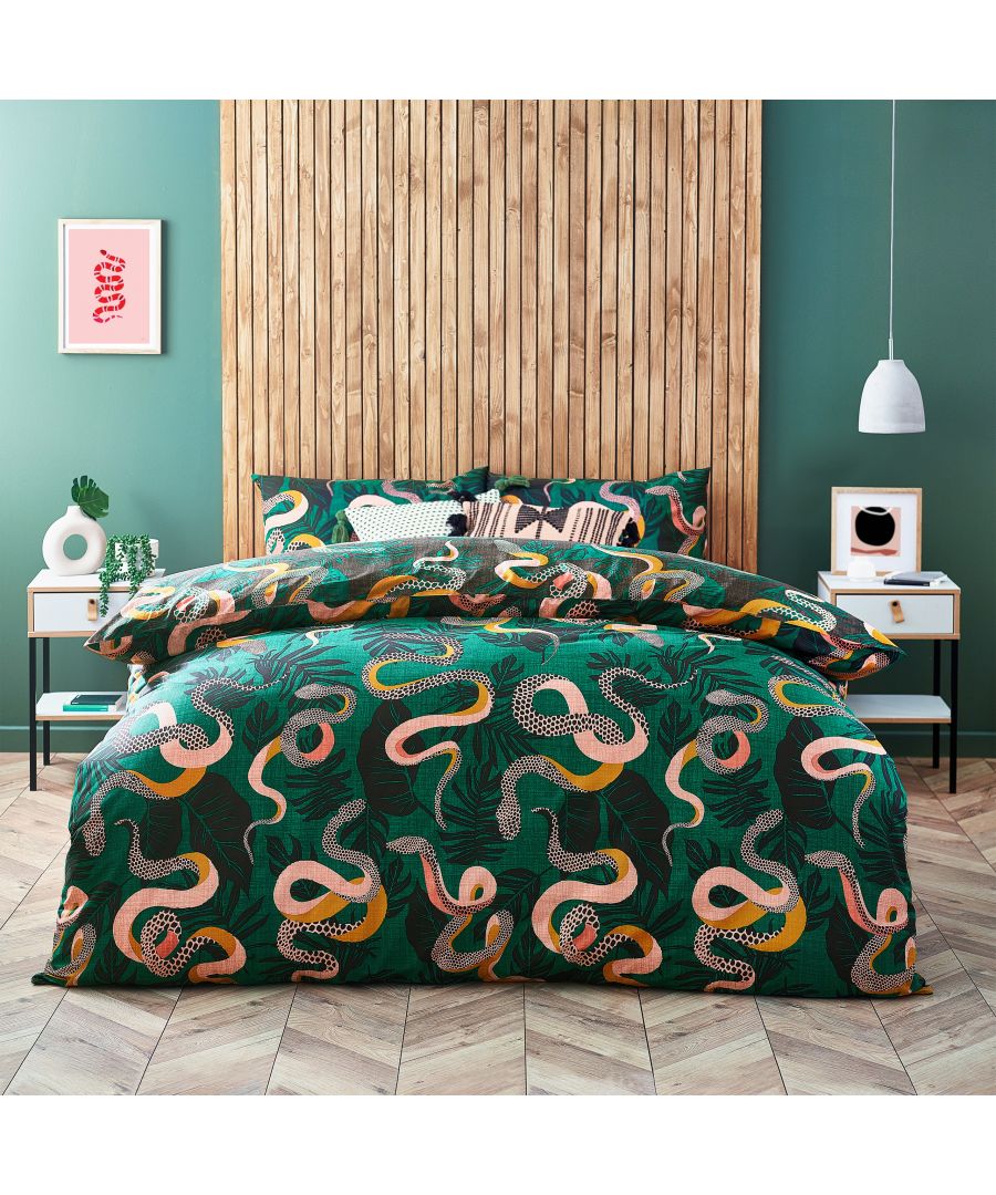 Add instant personality into your room with this bold design. This design will make a statement with its vivid snakes roaming through tropical palm leaves. The reverse features a coordinating pattern on a dark background.