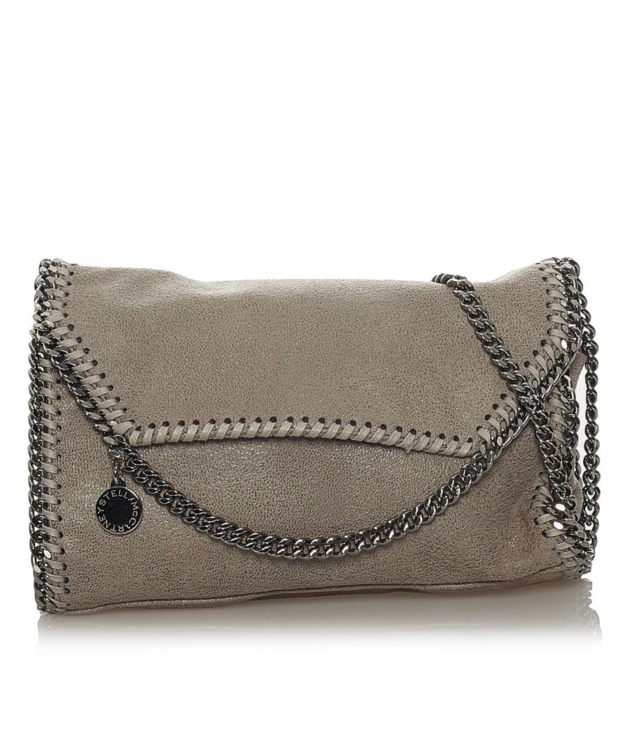 VINTAGE. RRP AS NEW. The Falabella crossbody bag features a faux leather body, a silver-tone chain strap, a front flap with magnetic snap button closure, and an interior slip pocket.Exterior back is out of shape, scratched and stained. Exterior bottom is stained. Exterior front is out of shape and scratched. Exterior side is out of shape and scratched. Lock is scratched.\n\nDimensions:\nLength 14cm\nWidth 20cm\nDepth 5cm\nShoulder Drop 49cm\n\nOriginal Accessories: This item has no other original accessories.\n\nColor: Gray x Light Gray\nMaterial: Fabric x Others x Metal x Brass\nCountry of Origin: Germany\nBoutique Reference: SSU147067K1342\n\n\nProduct Rating: GoodCondition\n\nCertificate of Authenticity is available upon request with no extra fee required. Please contact our customer service team.