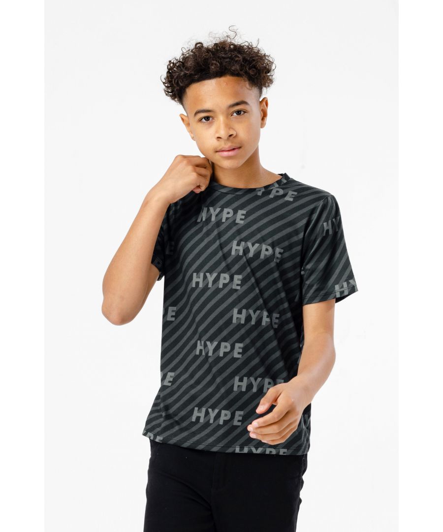 Make a statement in the HYPE. Boys Black Illusion T-Shirt. Designed in our standard kids tee shape and made from a soft touch 95% polyester 5% elastane fabric blend in black for the ultimate comfort. Featuring an all-over illusion print with diagonal lies and the HYPE. logo in grey and finished with a crew neckline and short sleeves. Wear with jeans and a jacket for a casual-smart fit or a pair of black HYPE. joggers for a more casual look. Machine wash at 30 degrees