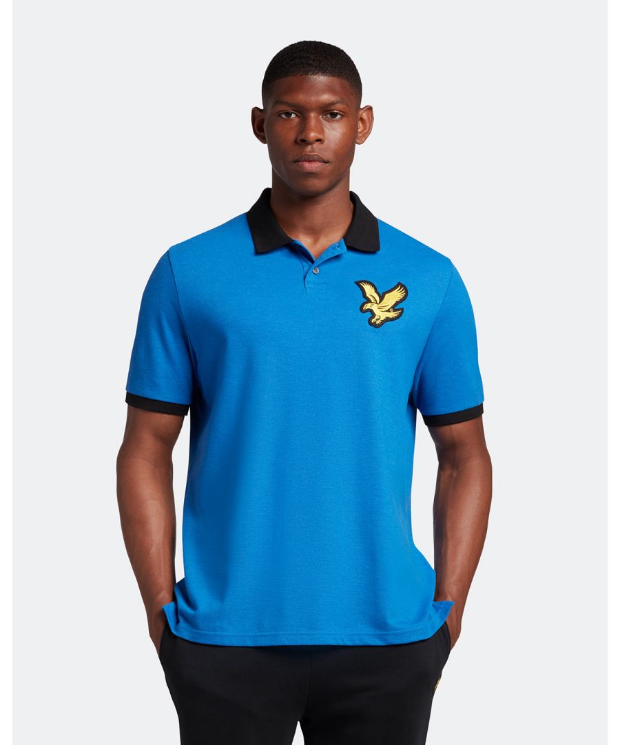 Stand out from the crowd with the stylish Lyle & Scott men's Block Marl Polo Shirt. With contrasting colourblock detail and the striking Golden Eagle logo on the chest, this must-have polo is an easy way to elevate any wardrobe. \n \nFit: Relaxed\nThis is crafted to create a comfortable, looser than usual fit that adds a contemporary spin to our classic designs. If you're caught between two sizes, we recommend you take the smaller size, given that the piece is cut to be larger and roomier than our regular cut clothing.