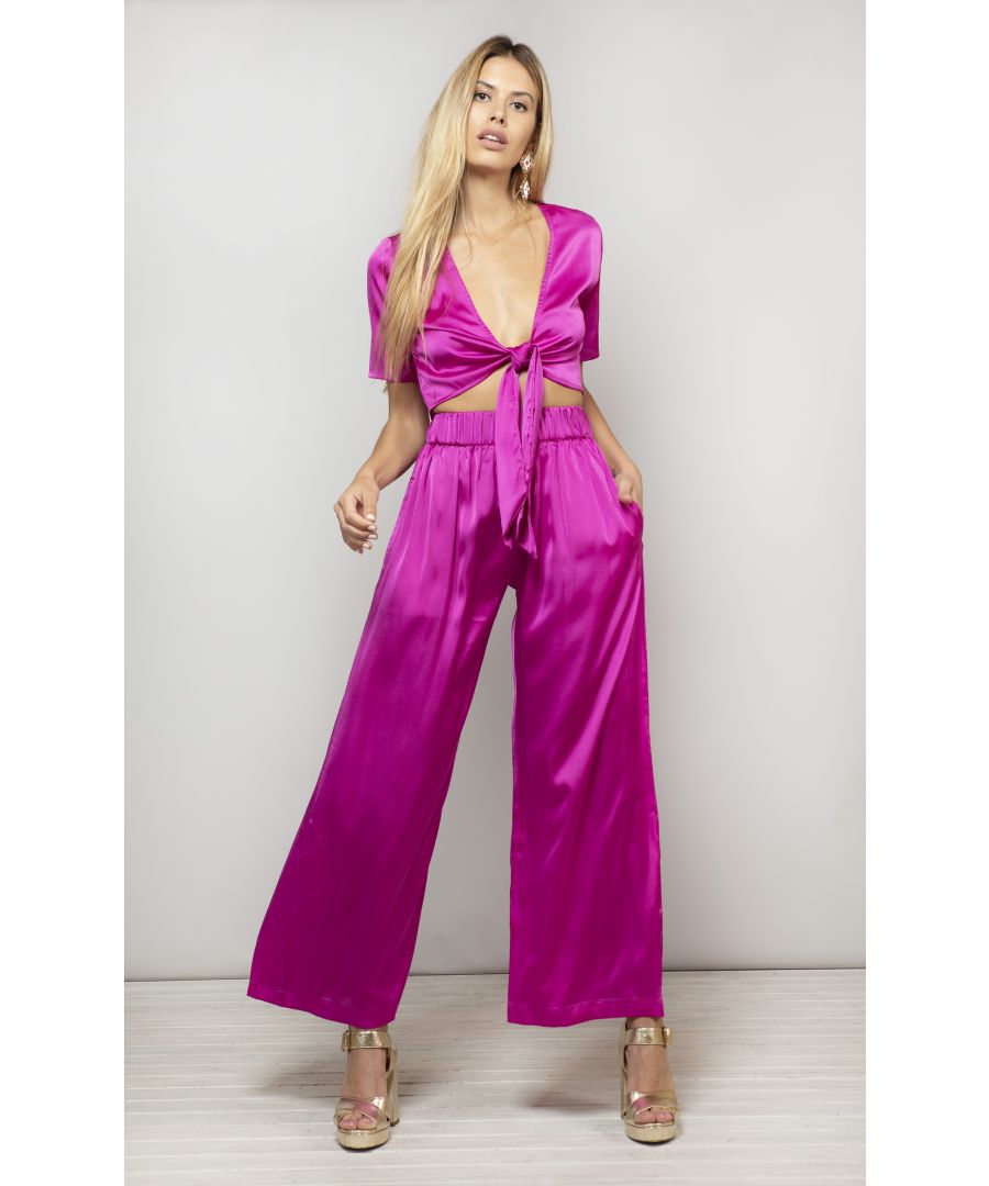 Wide leg trousers with elasticated waist band and slip pockets