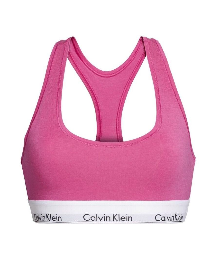 Lounge around in supreme comfort in this Calvin Klein Modern Cotton bralette. Featuring no cups, no lining, no padding, and heavenly soft touch, you can feel fully relaxed whilst wearing this. However, there is an elastic under-band so you can still feel supported. This bralette was designed for breathable comfort and a sporty look, making it a great lounge-at-home wear or great for sporting activities. The racerback styling means you have great movement of the shoulders. With the Calvin Klein branding along the under-band, you can still feel stylish in this simple and comfortable bralette.\n\nSimple yet stylish bralette\nNo cups, lining or padding\nElastic under-band\nRacerback styling\nCalvin Klein branding\nComposition: 53% Cotton | 35% Modal | 12% Elastane\n\nListed in UK sizes