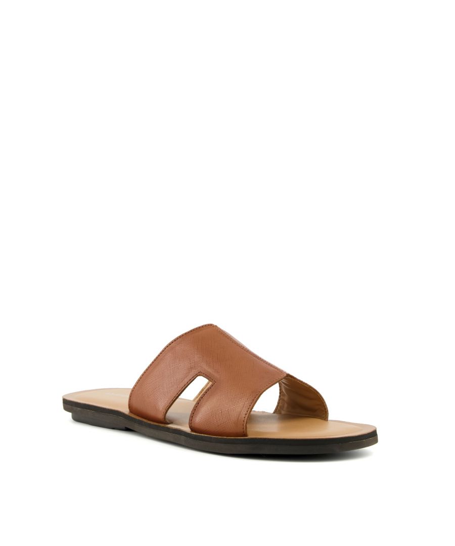 Slip into a new level of luxury with slider sandal Inta. Expertly crafted with the finest material, this minimal square-toe silhouette is expertly constructed with cut-out-strap detailing. An effortless way to update your warm-weather style.