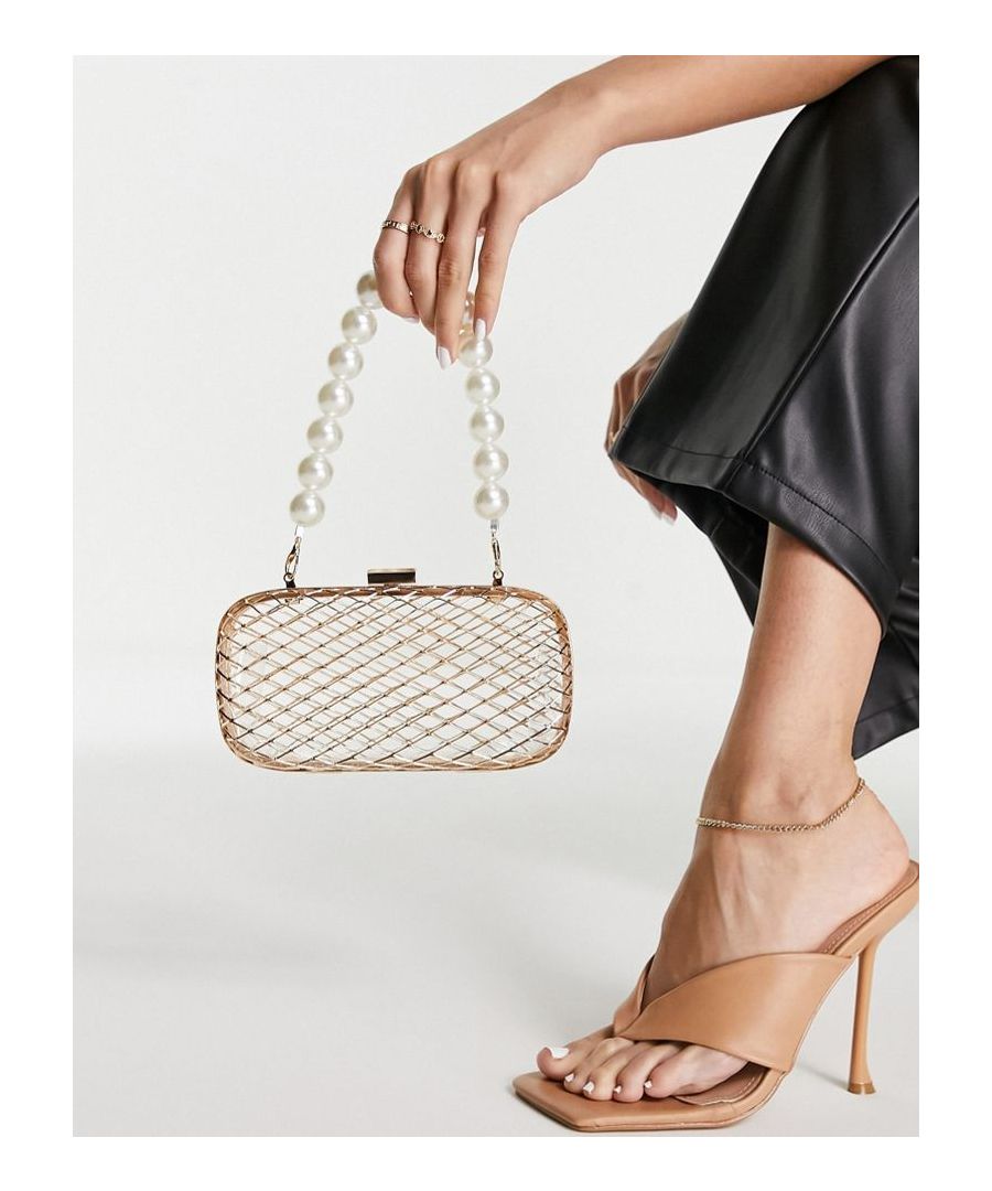 Clutch bag by ASOS DESIGN Can you fall for a bag? Caged design Detachable faux-pearl grab handle Snap-buckle closure Sold by Asos