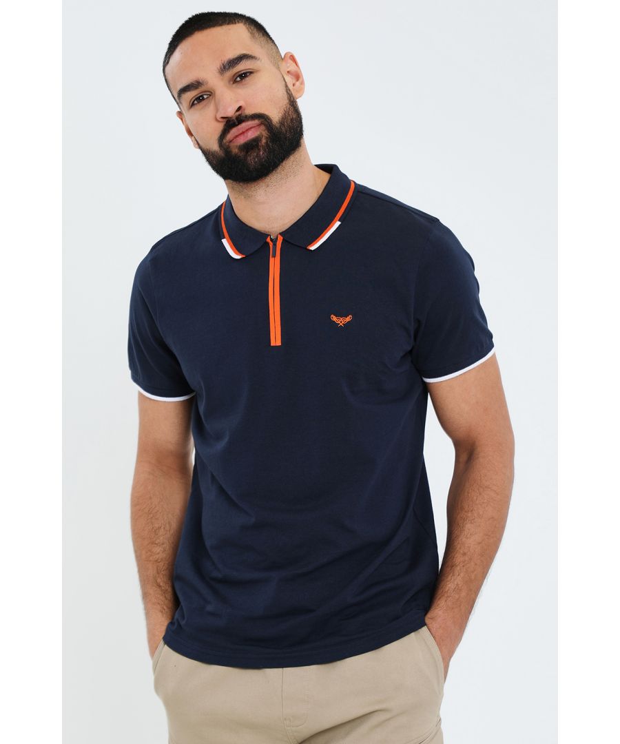 Keep it cool in this jersey polo shirt from Threadbare, perfect for casual days and smarter outings. Cut in a regular fit, this polo shirt has contrast tipping to the collar, concealed zip, and the signature Threadbare embroidery to the chest. The sleeves are finished with ribbed cuffs, and the polo is complete with a woven label on the hem. Team with jeans, chinos or shorts for a laidback luxe look.
