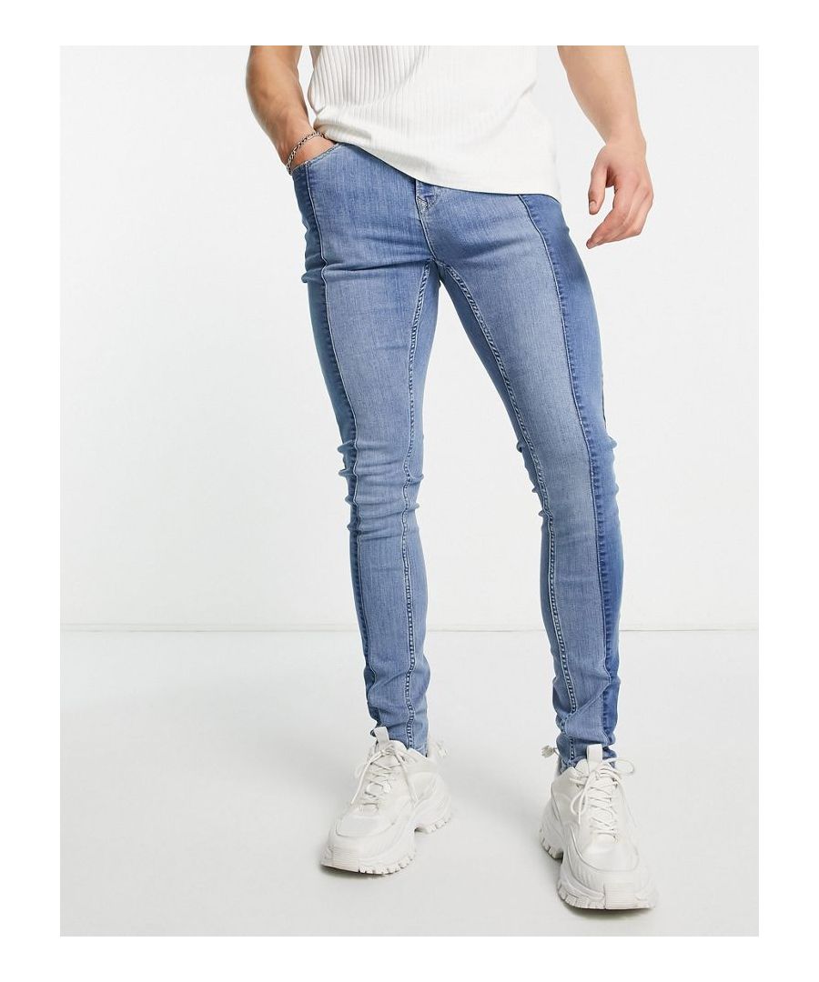Skinny jeans by Topman Regular rise Belt loops Five pockets Contrast panels Skinny fit Sold by Asos