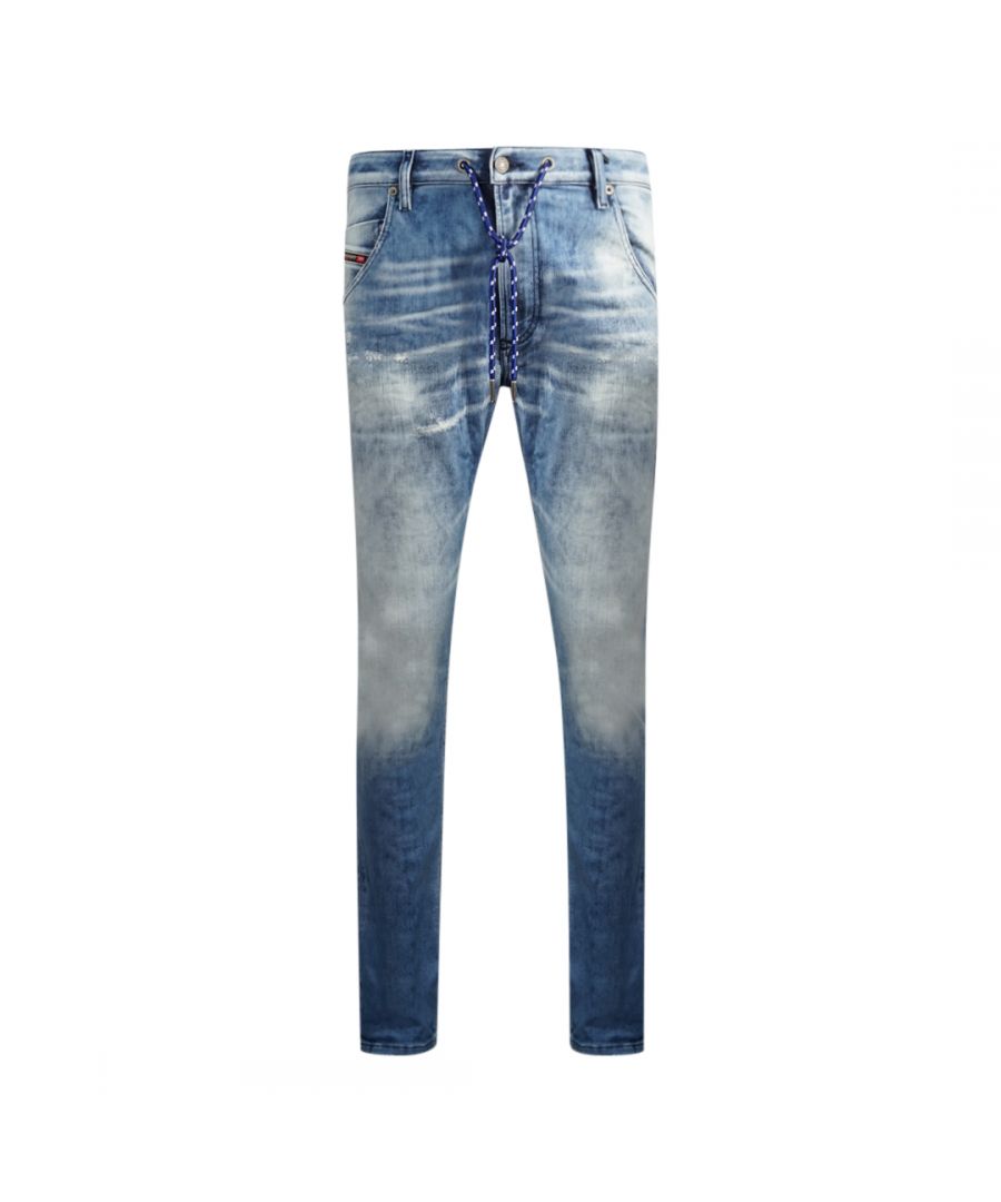 Diesel Krooley-X-T 0099Q Jogg Jeans. Diesel Krooley-X-T 0099Q Jogg Jeans. Drawstring Fasten Waist. Faded Treated Denim Style, Branded Badge. Jogg Jeans with Super Stretch Material,  95% Cotton, 3% Polyester, 2% Elastane. Style: KROOLEY-X-T 00S2IK-0099Q-01