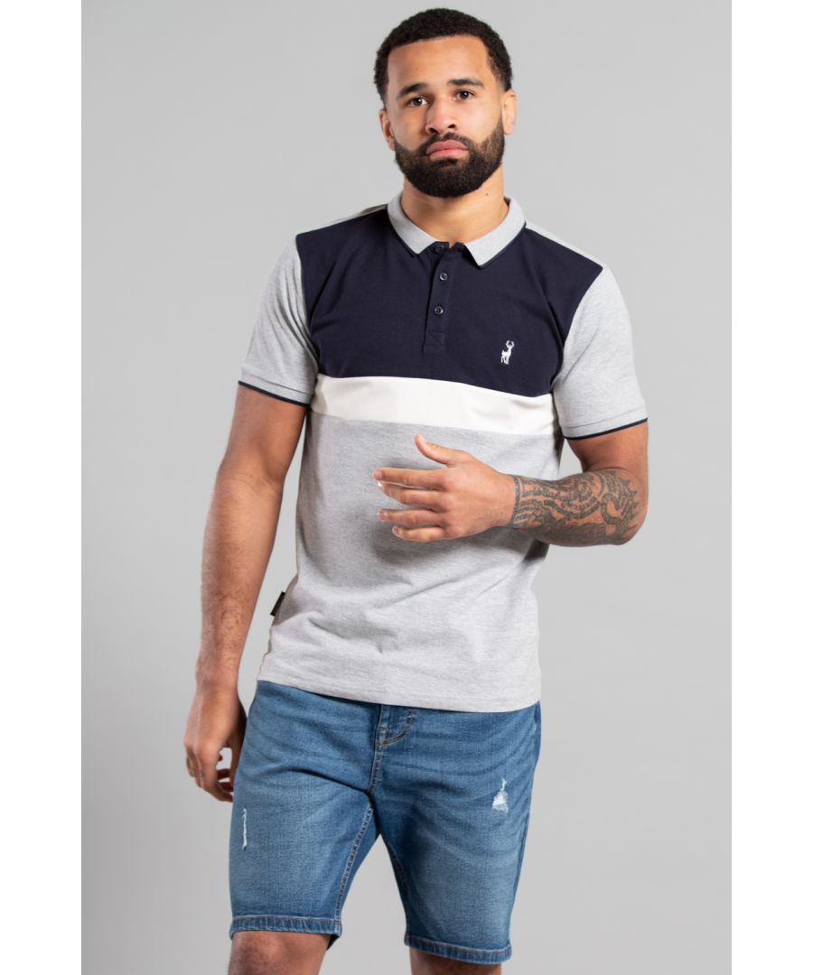 Get a timeless look with Kensington Eastside's classic colour-block polo shirt. Made from 100% cotton in a pique knit, it's both comfortable and stylish. Featuring an embroidered logo on the chest, this shirt is perfect for casual outings. Shop now and elevate your wardrobe with this versatile piece. This polo is machine washable and easy to care for!