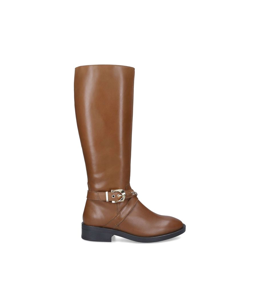 The Rider High is a high knee boot crafted in tan leather. The front of the ankle features a gold tone chain and larger metal faceted buckle. Gold tone interior size zip. This product features 'All Day Long' technology.