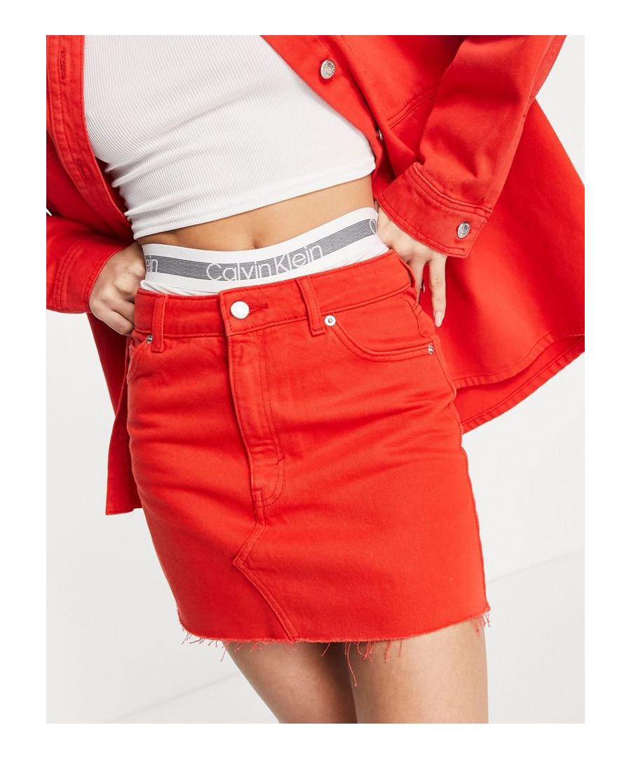 Denim skirt by Topshop Part of a co-ord set Jacket sold separately High rise Belt loops Five pockets Raw-cut hem Slim fit Sold By: Asos