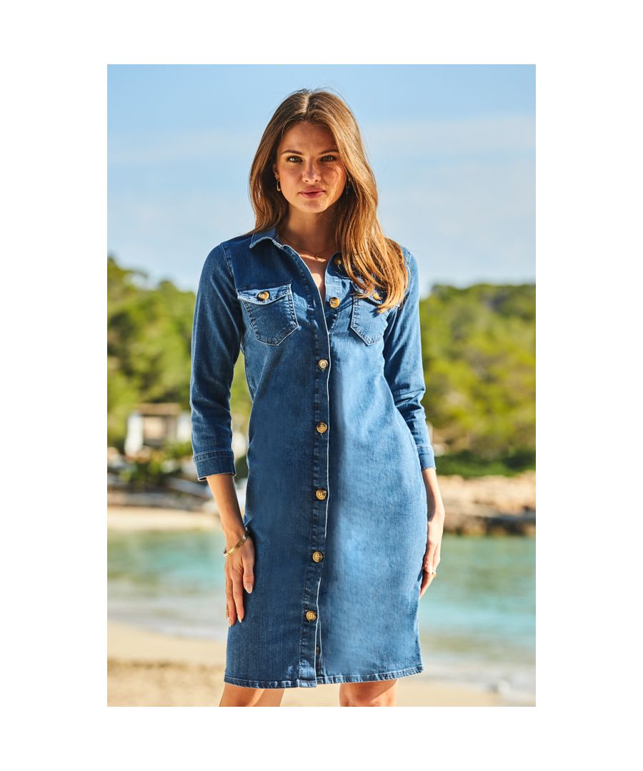 REASONS TO BUY:\n\nComfort + style = the dress of dreams\nBody-skimming shift style\nSoft stretch denim fabric\nLuxe horn buttons\nPatch pocket front\nFlat sandals, trainers, wedges - it goes with them all