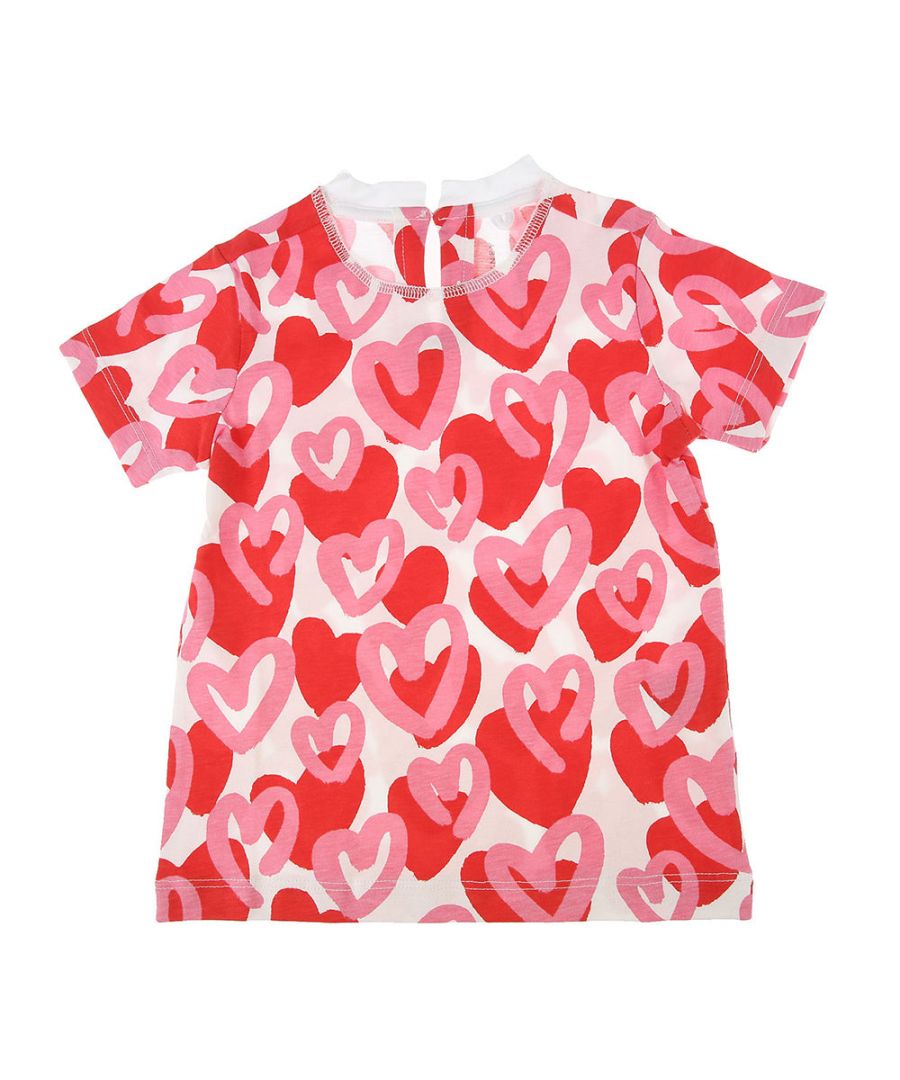 This Stella McCartney Girls Love Heart Print T-shirt in White is crafted from sustainable cotton and features a crewneck, short sleeves, a button closure on the back and an all-over  print.\n\nSustainable cotton\nCrew neck\nShort sleeves\nButton closure