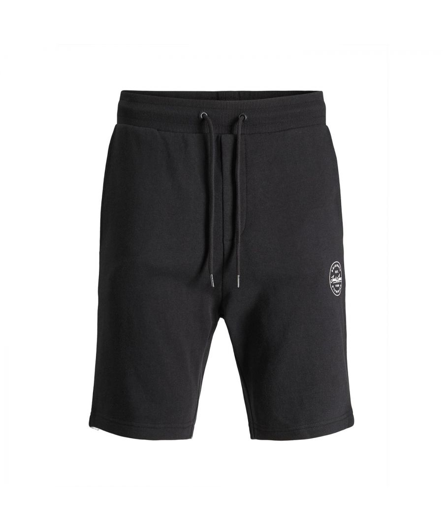 For chilling on the couch or for your everyday casual outfit – these cosy sweat shorts you won't want to take off anymore, so cosy it is. The shorts are made of pure cotton. This makes it soft to the touch and very skin. Style-forming for the sporty shorts by JACK & JONES are the elastic waistband with drawstring\n\nFeatures:\nSweat shorts with a small logo print\nLoopback for reliable warmth and air circulation\nSide pockets and welt back pocket\nElastic waistband with drawstring\nUnbrushed\n\nSpecifics: \nMaterial: 100% Cotton\nProduct Code: 12182595\n\nWashing Instruction:\nMachine wash at max 40°C under gentle wash programme\nDo not bleach\nTumble dry on low heat settings\nHang dry\n\nIron Temp: Iron on medium heat settings\n\nNote: Do not bleach, Dry clean (no trichloroethylene)\n\nPackage Includes: Jack&Jones Loopback Sweat Shorts, Select your size