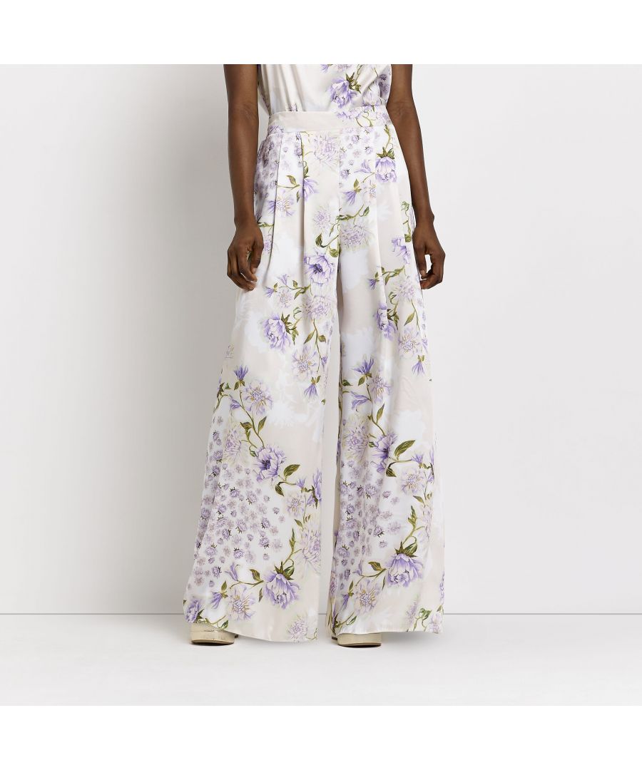> Brand: River Island> Department: Women> Material: Polyester> Material Composition: 100% Polyester> Type: Trousers> Style: Harem> Size Type: Regular> Fit: Regular> Rise: Mid (8.5-10.5 in)> Leg Style: Wide-Leg> Pattern: Floral> Occasion: Casual> Selection: Womenswear> Season: AW22