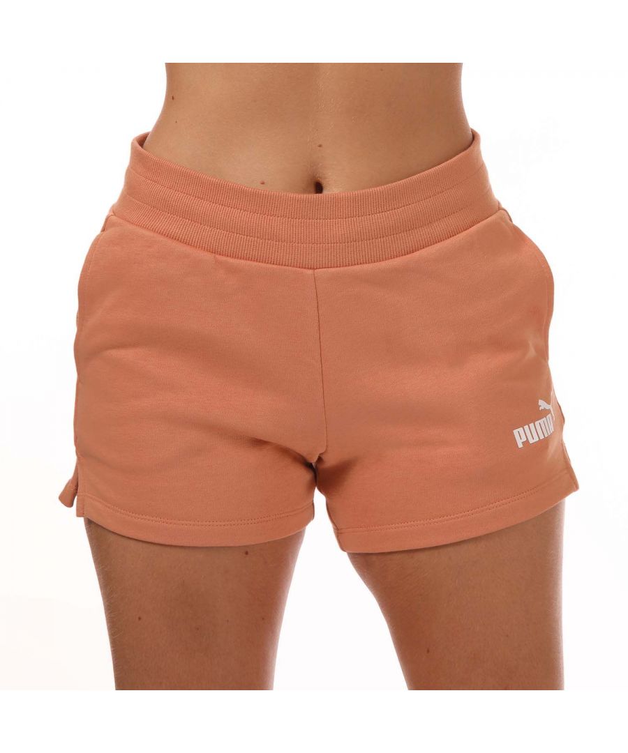 Womens Puma Essentials Sweat Shorts in peach.- Ribbed waistband with internal drawcord.- Side pockets.- Side slits.- PUMA logo print to hem.- Regular fit.- Shell: 68% Cotton  32% Polyester.- Ref: 58682477