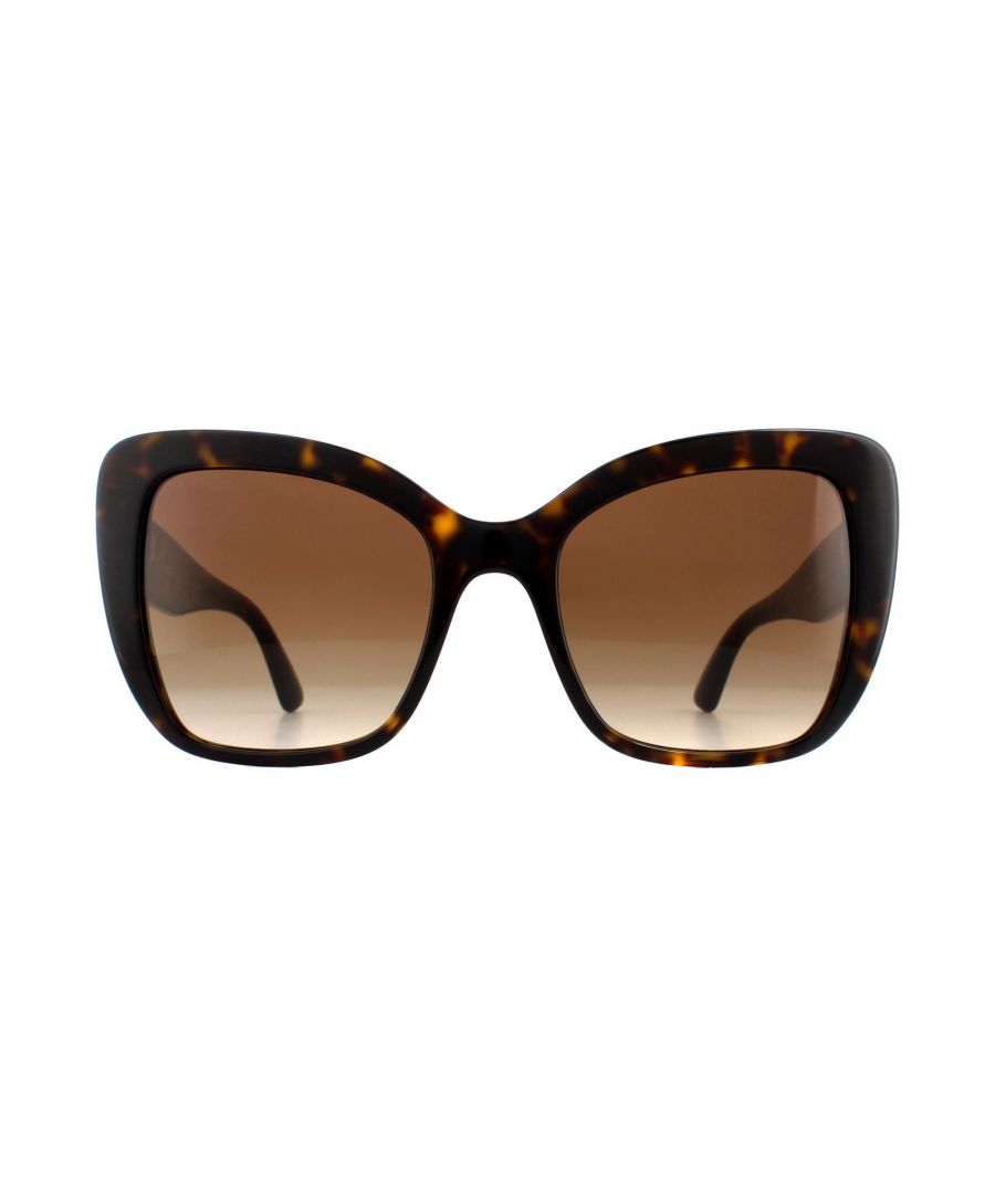 Dolce & Gabbana Sunglasses DG4348 502/13 Havana Brown Gradient are a sophisticated oversized cat eye style for women. The DG4348 are a simple yet dramatic shape and perfect for a fashionista. The thick acetate frame features the Dolce & Gabbana logo in metal with a matching metal accent at the hinge.