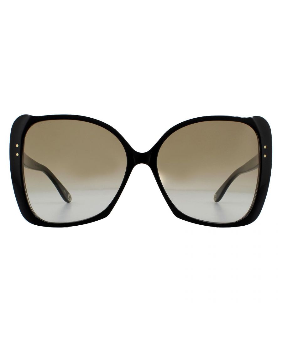 Gucci Sunglasses GG0471S 001 Black Brown Gradient are a gorgeous oversized butterfly style featuring feminine corner flicks. The Gucci text logo features on each temple for brand recognition.
