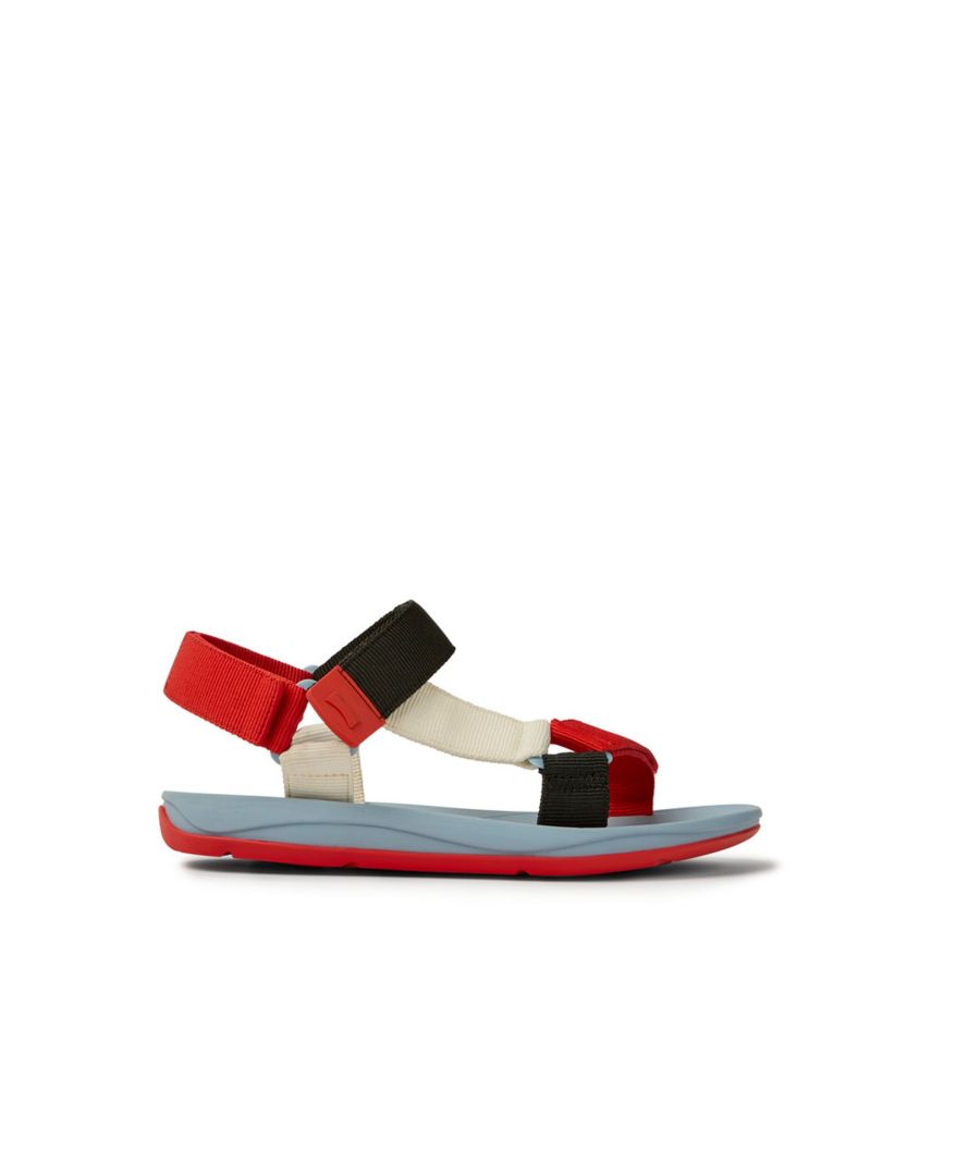 Red, white, and black men's sandals with 100% recycled PET straps, EVA outsoles, and a hook-and-loop closing system. \n\nOur Match sandal is a testament to comfort and functional design with a lightweight outsole and quick-dry webbing straps made from 100% recycled PET.