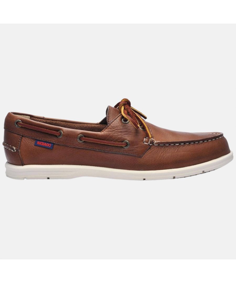 Constructed to be the perfect modern nautical footwear, these light and snug boat shoes are made with tumbled full- grain leather and hand-sewn with the finest craftsmanship: they come with leather sock lining, 360° rawhide lace system and non-marking antislip soles which combine resistant siped rubber for stable grip and a phylon midsole for additional shock absoprtion and an all-day comfort.\n\nThe “Naples” mocs are the ideal shoe to enjoy the life in one of the most picturesque and fun cities in Western Maine: the beautiful town of Naples, with its spectactular sunsets around the beloved Long lake and Brandy Pond water stretches.