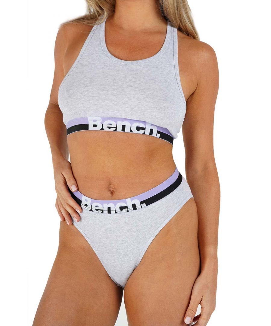 The ‘Sienna’ crop top and brief set from Bench is made from a soft cotton rich fabric to keep you comfortable all day long. This set includes a racerback crop top with colour block elasticated underband and a matching pair of briefs that also feature a matching colour block elasticated waistband. Both items feature the iconic Bench logo.