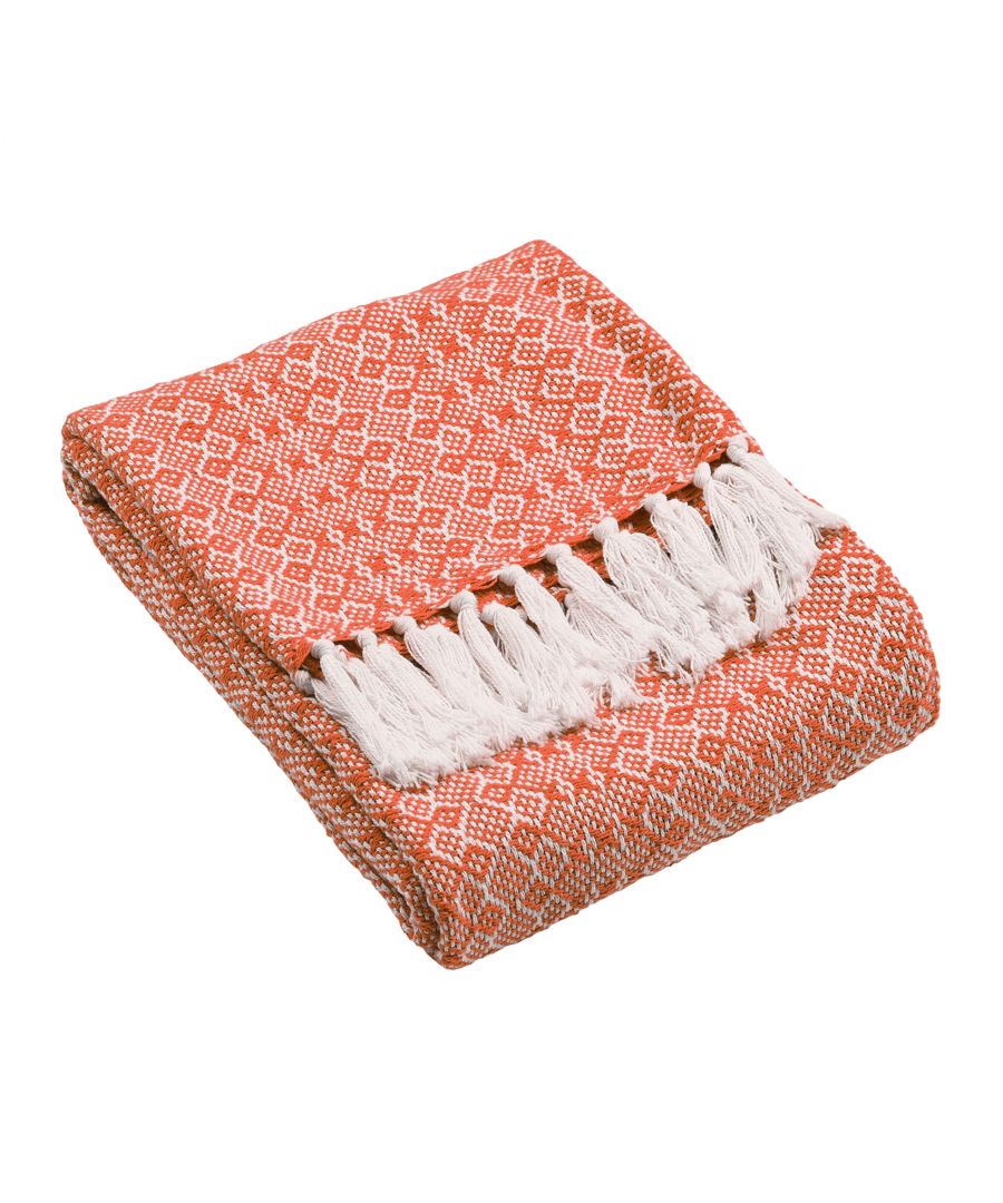 The Jewels cotton throw features a subtle geometric weave and tassel fringing on two sides, for a laid back, cosy look. Perfect for cool summer evenings, or for layering up and adding texture to your home.