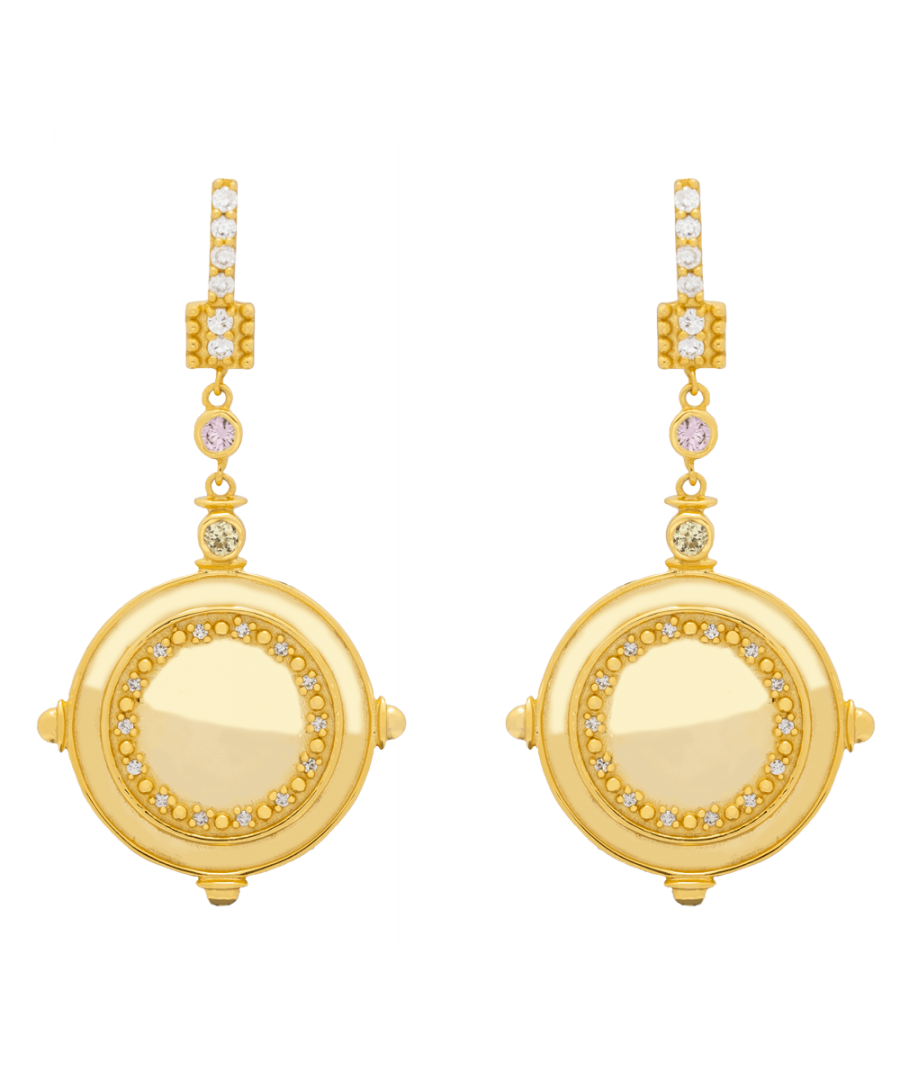 These long Earrings are a unique and are a very original design piece. From a line decorated with zircons and different elements, hangs a golden coin with a spectacular design. Discover the Necklace and make a set.