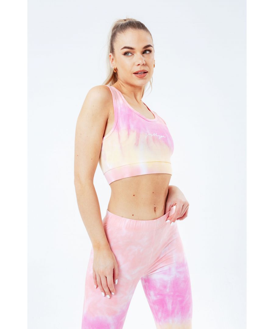 The hype. Pink tie dye scribble logo womens bralet features a micro poly fabric for the ultimate comfort. In an all over pink, white and yellow colour palette in our iconic tie dye effect. With a contrasting hype. Signature logo across the front, finished with an elasticated waistband. Wear with matching leggings and over-sized denim jacket for an off-duty casual look. Machine wash at 30 degrees.