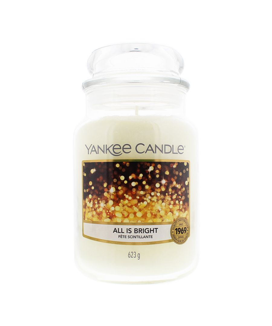 The Yankee All Is Bright Candle is a candle that contains a blend of sparkling citrus notes on a bed of warm musk, leading to a delightful citrus fragrance that fills the room with a welcoming and happy scent. The candle is made from premium grade paraffin wax which delivers a clean, consistent burn and has a burn time of between 110 and 150 hours.