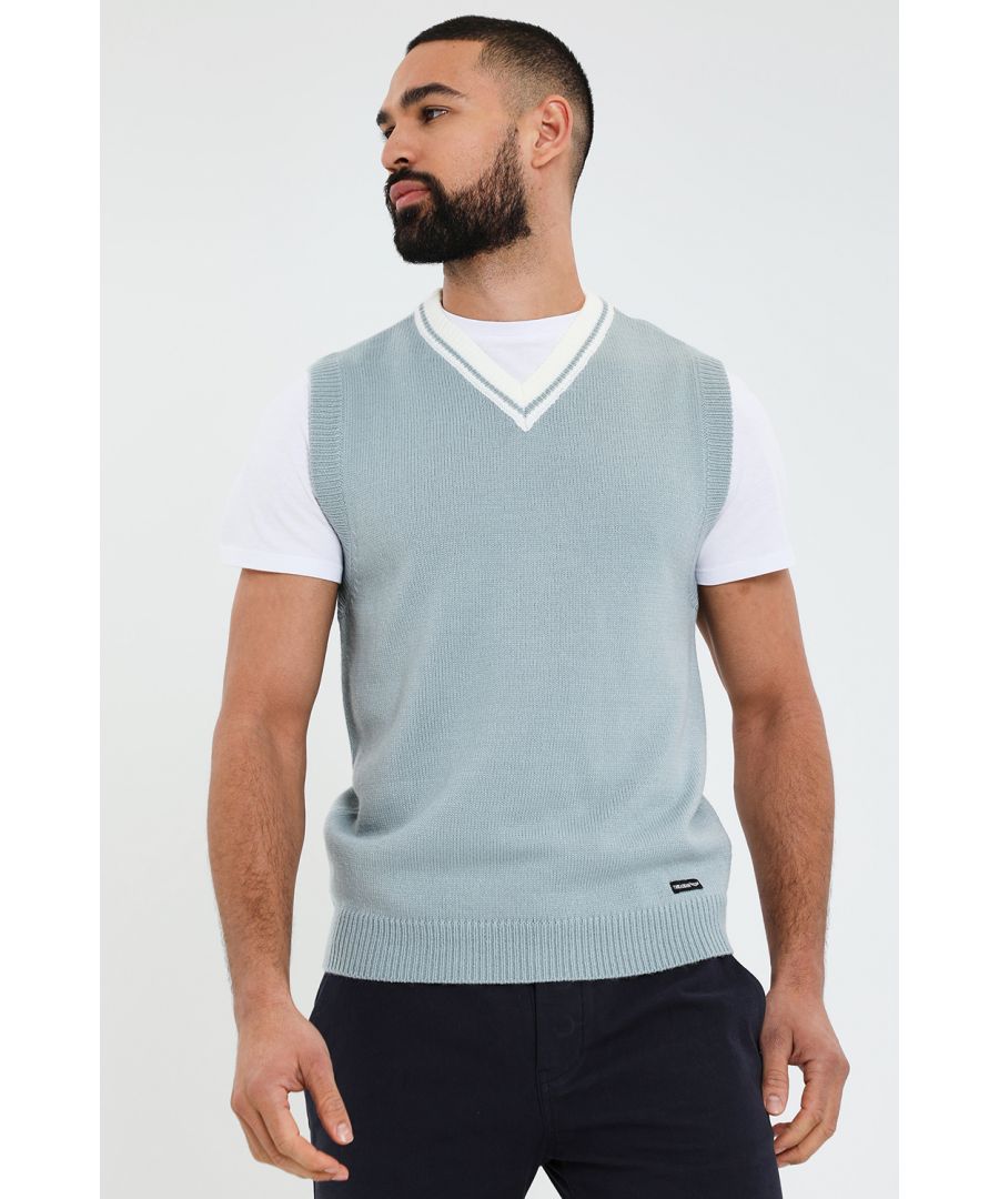 This v neck knitted sweater vest from Threadbare has a relaxed, sporty feel and can be layered with your favourite jeans and t-shirt or worn on its own. This regular fit vest features a contrast, ribbed v neck with tipping detail as well as ribbed armholes and hem. A great addition to your wardrobe this season to smarten up any look.