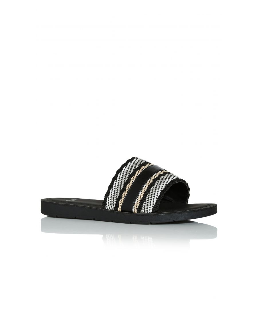 The easy slip on sandals you'll be wearing on-repeat. A classic monochrome colourway is versatile and easy to pair, whilst a flat sole and slip on-design will make these your new go-to pair.