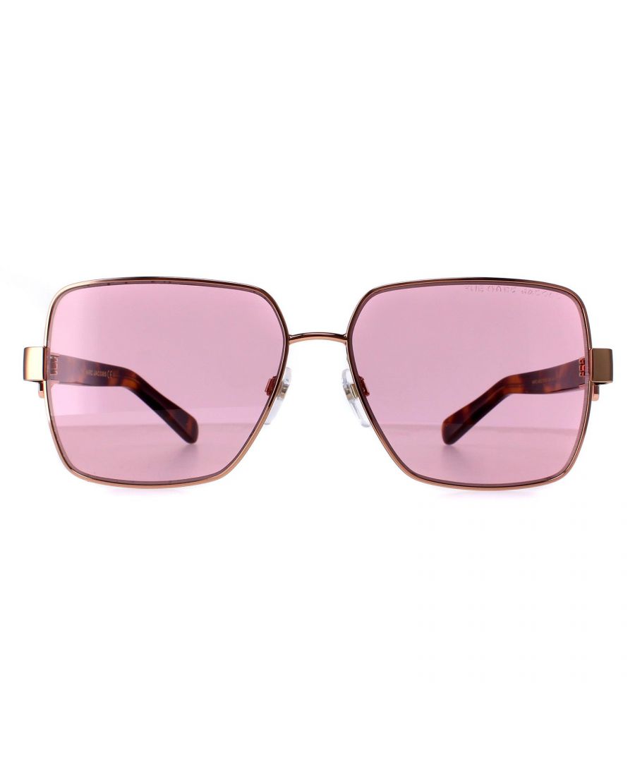 Marc Jacobs Square Womens Gold Copper Pink MARC 495/S  Sunglasses feature a lightweight and durable metal frame, ensuring long-lasting wear. Silicone nose pads ensure all day comfort while temples are adorned with the iconic Marc Jacobs logo, adding a touch of sophistication and elegance to the overall look.