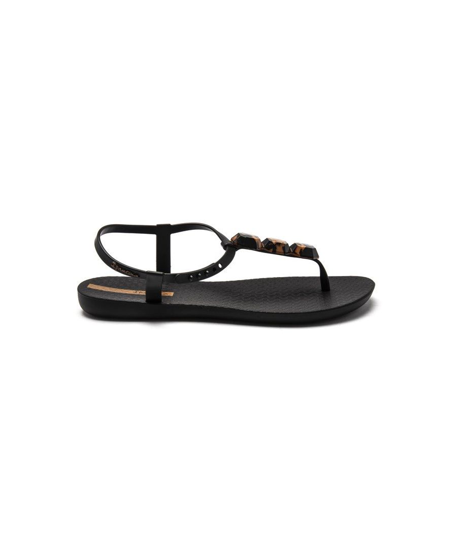 Women's Black Ipanema Charm Vegan Friendly And 100% Recyclable Flip Flops, Featuring A T-bar Design With A Popper Adjustable Ankle Strap And Thong Strap embellishment. These ladies' Sandals Are Designed And Made In Brazil With Eco-friendly Materials, Are Water Friendly, With A Rubber Sole.