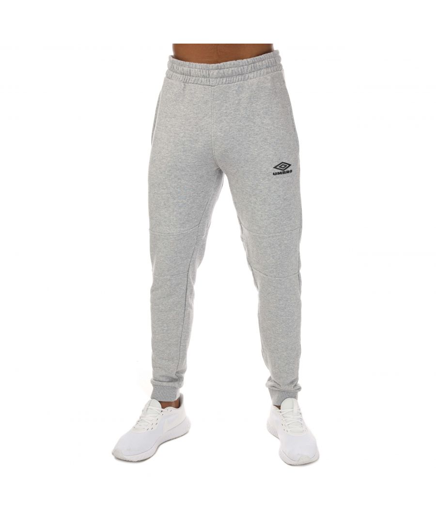 Mens Umbro Diamond Skinny Jog Pants in grey.- Adjustable waistband.- Side pockets.- Back pocket.- Umbro logo in a raised print to the front leg.- Ribbed cuffs.- Regular fit.- 60% Cotton  40% Polyester.- Ref: UMJM0636B43GRY