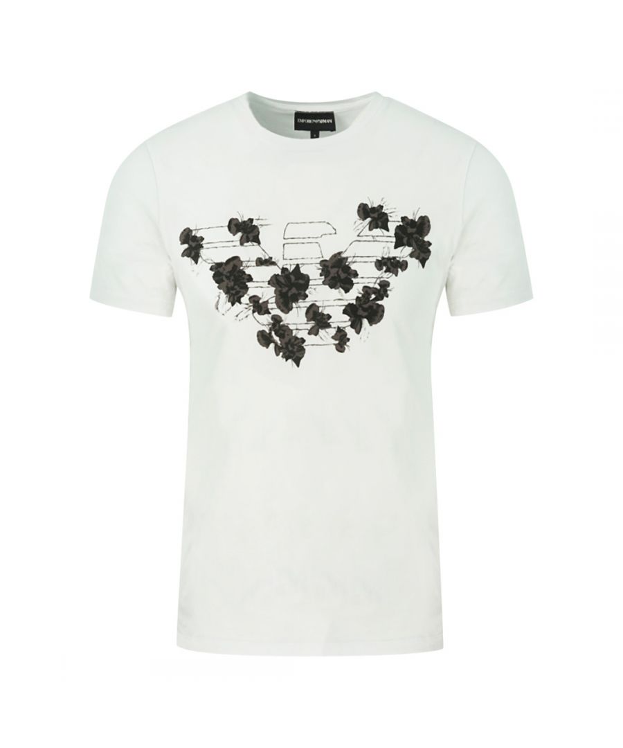 Emporio Armani wit T-shirt met adelaarslogo in bloemenprint. Emporio Armani wit shirt met adelaarslogo in bloemenprint. Adelaarslogo met bloemendetail op de voorkant van het shirt. 100% katoen. Ronde hals, korte mouwen. Stijl: 6H1T6T 1JQ4Z 0100