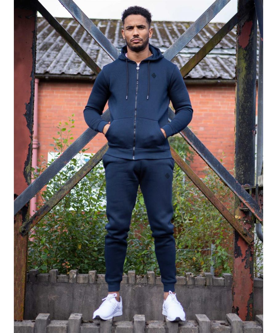 Enzo Mens Zip Up Tracksuit Set. Enzo Hoodie Full Zip Through Hooded Top. Enzo Embroidery Logo on Chest. Brush Back Fleece Hoodie with Drawstring. Ribbed Waist and Cuffs. Kangaroo Pockets.. Mens Slim Fit Joggers. Elasticated Waist with Drawstring. Enzo Logo Embroidery on Leg. 2 Pocket Design