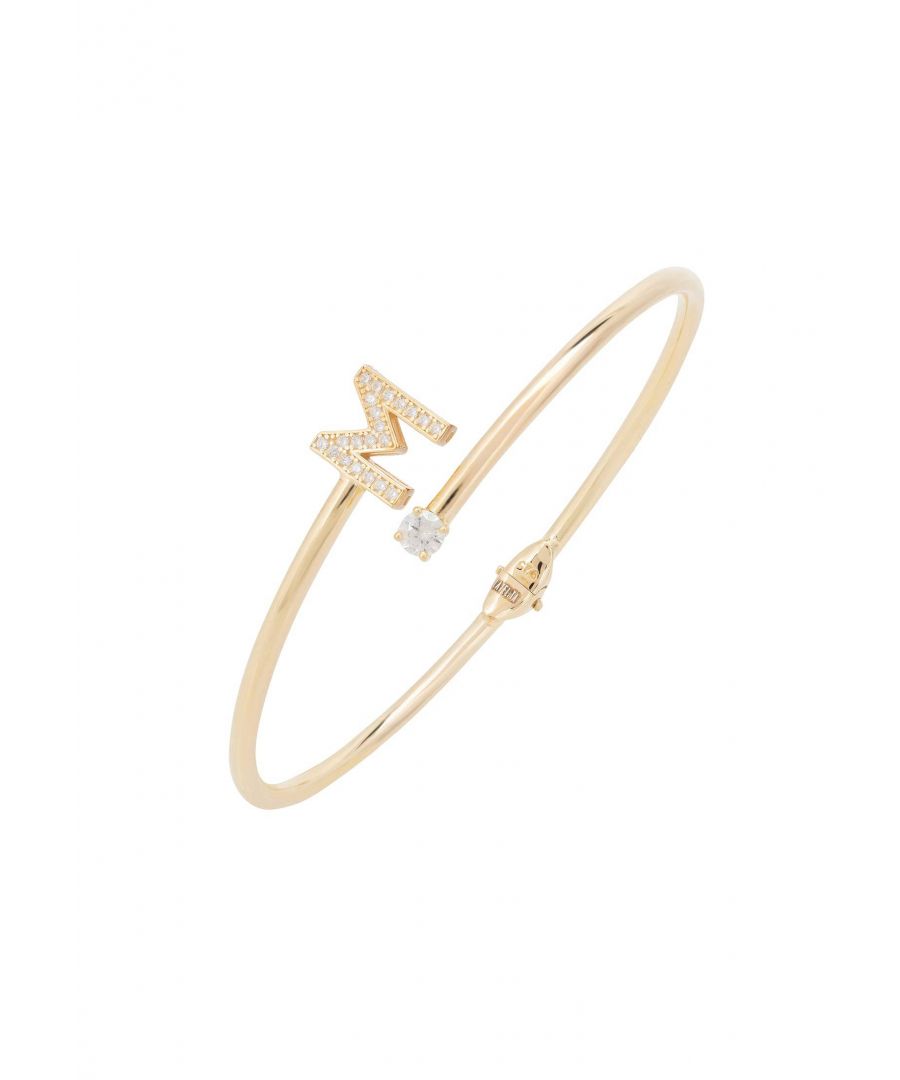 Design:This simple but beautifully styled initial bangle bracelet is perfect for those who covet delicate jewellery with a hint of sparkle, offering a sophisticated finishing touch to any outfit.Pretty and petite, this initial open cuff bangle features a hinge on the underside which makes it easy to put on and take off. The opening is designed to be on top of the wrist, where a zircon adorned monogram sits on one side and a single larger cubic zirconia resides on the other.What can be more personal than a name? Give this initial bangle bracelet as the perfect personalised birthday gift. Materials:Handcrafted using 925 sterling silver, dipped in 22ct gold. White cubic zirconia.Style Notes:Perfect pairing to the initial ring.Personalised birthday gift ideas. Bridesmaid gifts. Simple everyday styling.Dimensions:Bracelet: 19.5cm Packaging:This item is presented in a Latelita London signature jewellery box.Care Instructions:To maintain your jewellery, wipe gently with a damp cloth that is soft and clean. Do not soak in water. Avoid contact with soaps, detergents, perfume or hair spray.