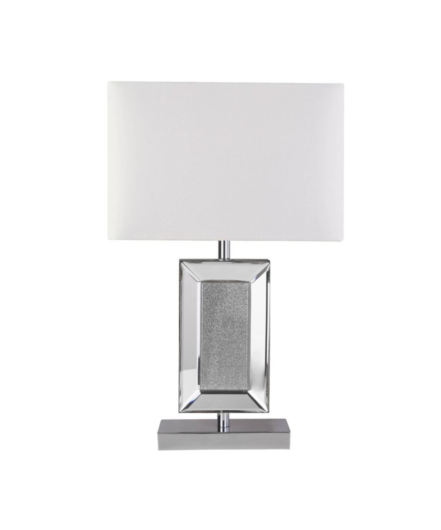 Modern polished chrome and mirrored table lamp boasting a white shade. Height: 47cm Width: 30cm Depth: 15cm Maximum Wattage: 40w Bulb: 1 x E27 Light Bulb (Not Included) Update your interior with the beautifully modern Angelica table lamp, exclusive to Pagazzi. Featuring a beautiful, silver glitter rectangle base, framed with bevelled mirror, this polished chrome table lamp is complete with a white, rectangular shade. Add some sparkle to your living room, hallway or bedroom with this stunning table lamp.