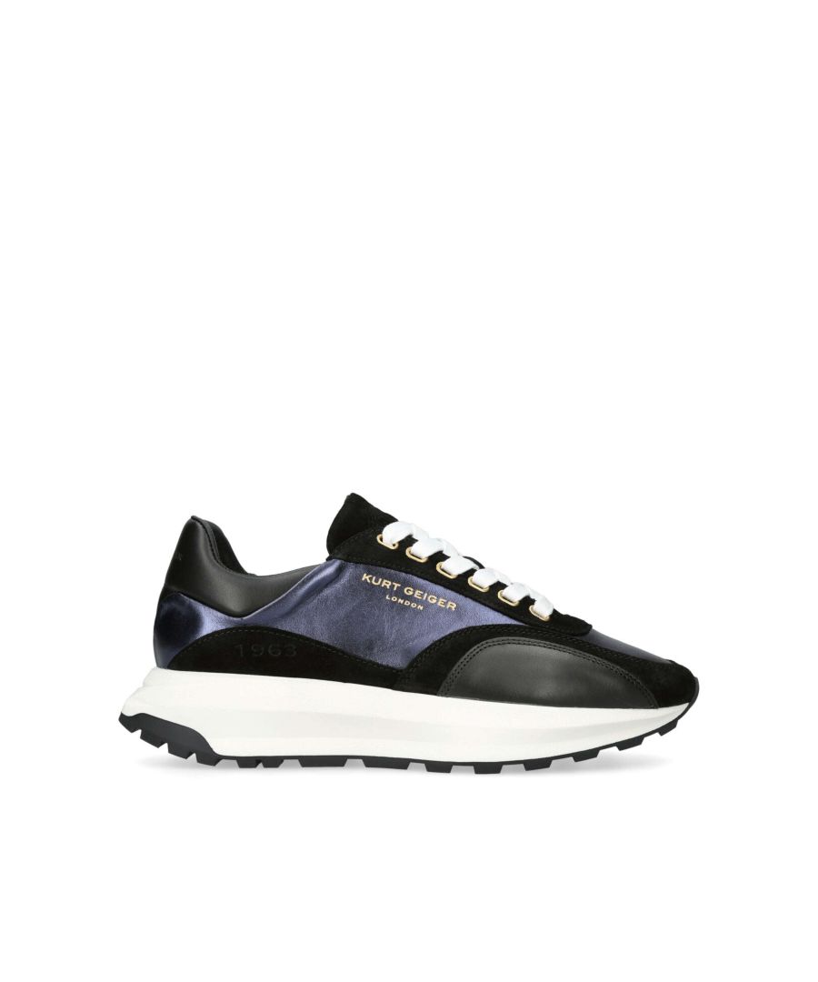 The Gaspar is a classic lace up sneaker in black and blue . The tongue has embossed branding which can also be seen at the heel. The sole is extra chunky in white with black tread.