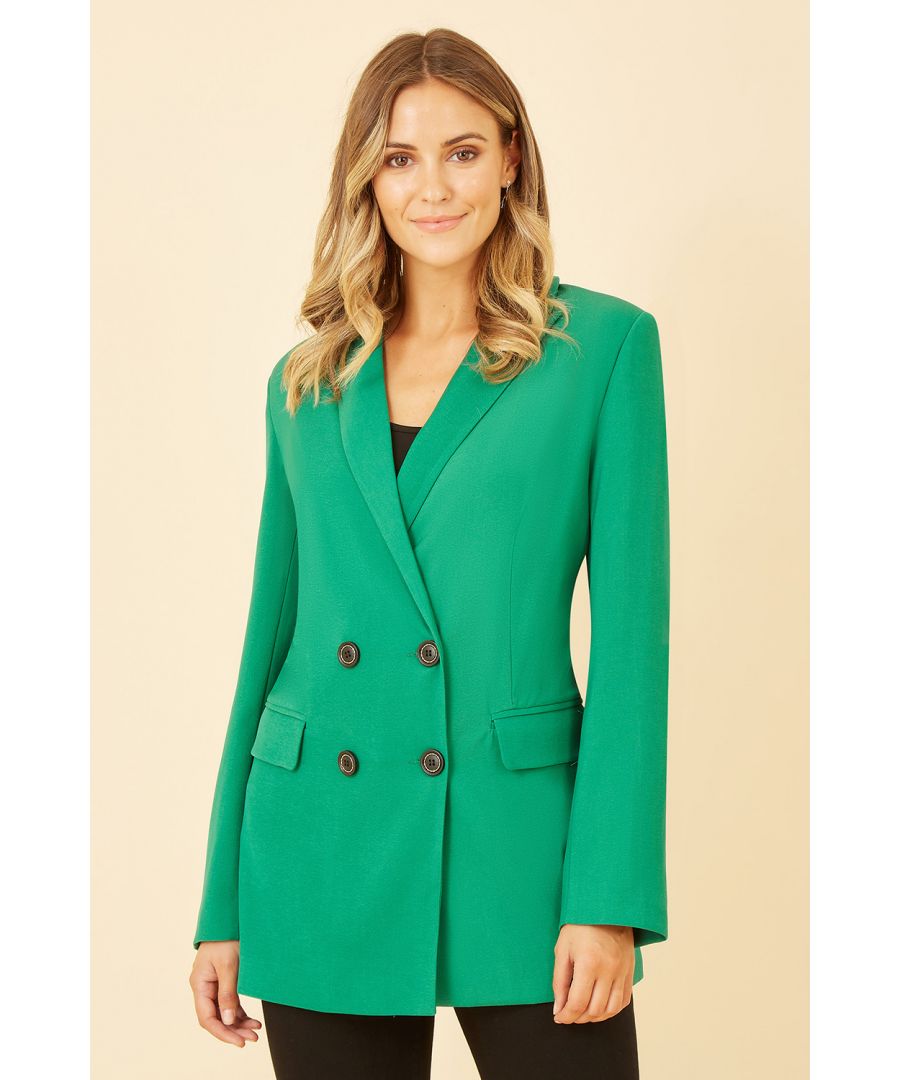 Blazers are this seasons must have. With it's relaxed fit and stunning shade of green, this one from Yumi should be top of your must have list, The long blazer style is topped with a leopard lining, double breasted button fastening, and pockets. Keep the styling casual; with jeans and T-shirts, trainer or loafers.