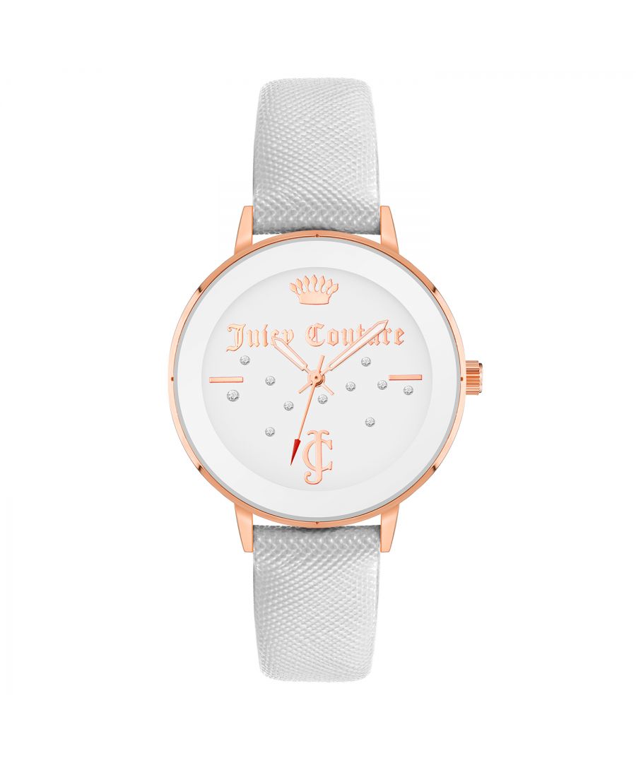 Juicy Couture Watch JC/1264RGWT\nGender: Women\nMain color: Gold\nClockwork: Quartz: Battery\nDisplay format: Analog\nWater resistance: 0 ATM\nClosure: Pin Buckle\nFunctions: No Extra Function\nCase color: Gold\nCase material: Metal\nCase width: 38\nCase length: 38\nFacing: Rhine Stone\nWristband color: White\nWristband material: Leatherette\nStrap connecting width: 16\nWrist circumference (max.): 23\nShipment includes: Watch box\nStyle: Fashion\nCase height: 8\nGlass: Mineral Glass\nDisplay color: White\nPower reserve: No automatic\nbezel: none\nWatches Extra: None