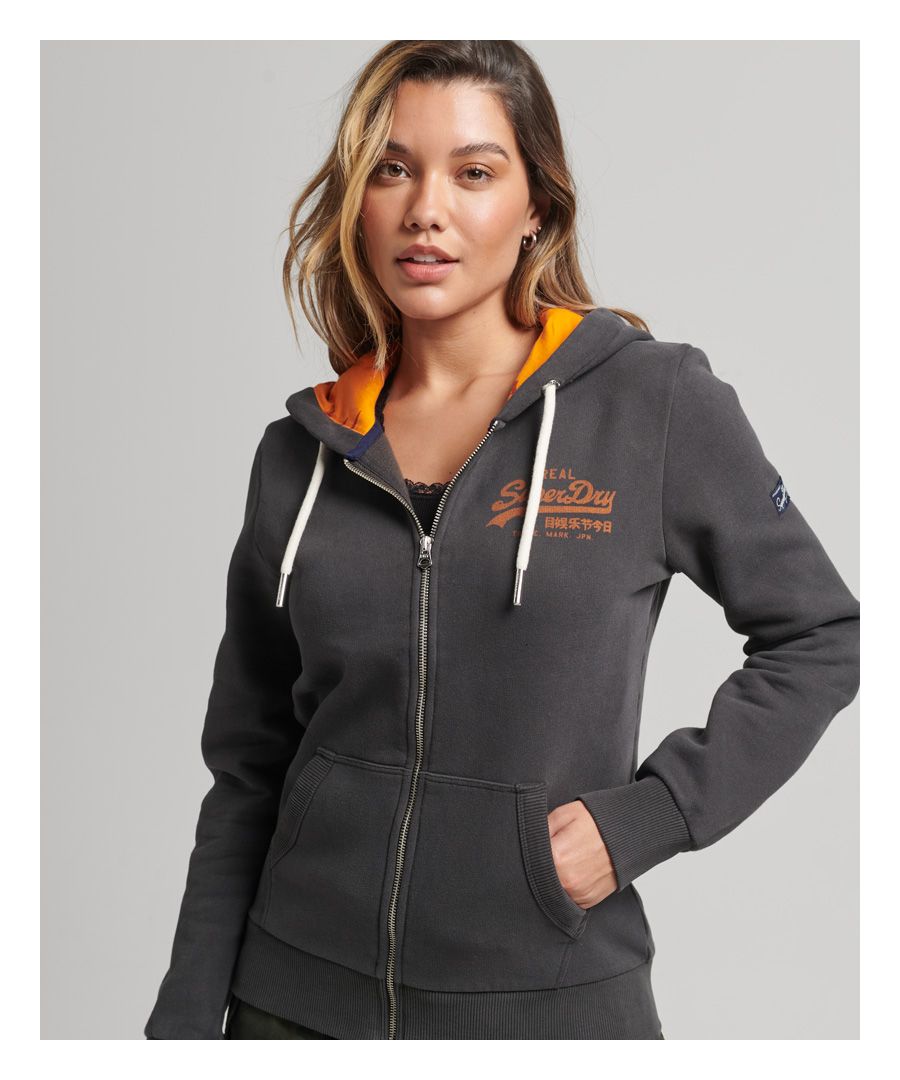 Our Inner All Over Print Zip Hoodie is a unique way to layer up. Our traditional zip hoodie is a trusted design that is sure to bring you comfort and warmth, thanks to its brushed lining and ribbed trims. We've taken this design one step further by including a print hood lining so you can feel confident while you make a subtle statement.Relaxed fit – the classic Superdry fit. Not too slim, not too loose, just right. Go for your normal sizeDrawcord hood with print liningZip fasteningPrint logoTwo pocketsRibbed cuffs and hemBrushed liningSuperdry tab