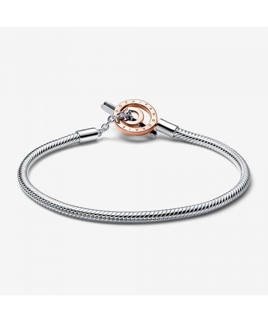 This dazzling Bracelet for Women from Pandora is the perfect gift to spoil yourself or a loved one. The Bracelet is made out of 925 Sterling Silver, colored Silver/Rose at Length: 17 cm weighing in at  grams with a Width of 0.41 cm at its widest point. The Pandora 'Pandora Signature' Women's 925 Sterling Silver Bracelet - Silver/Rose 582309C00-17 is delivered in a stunning gift box and carries a two year warranty.