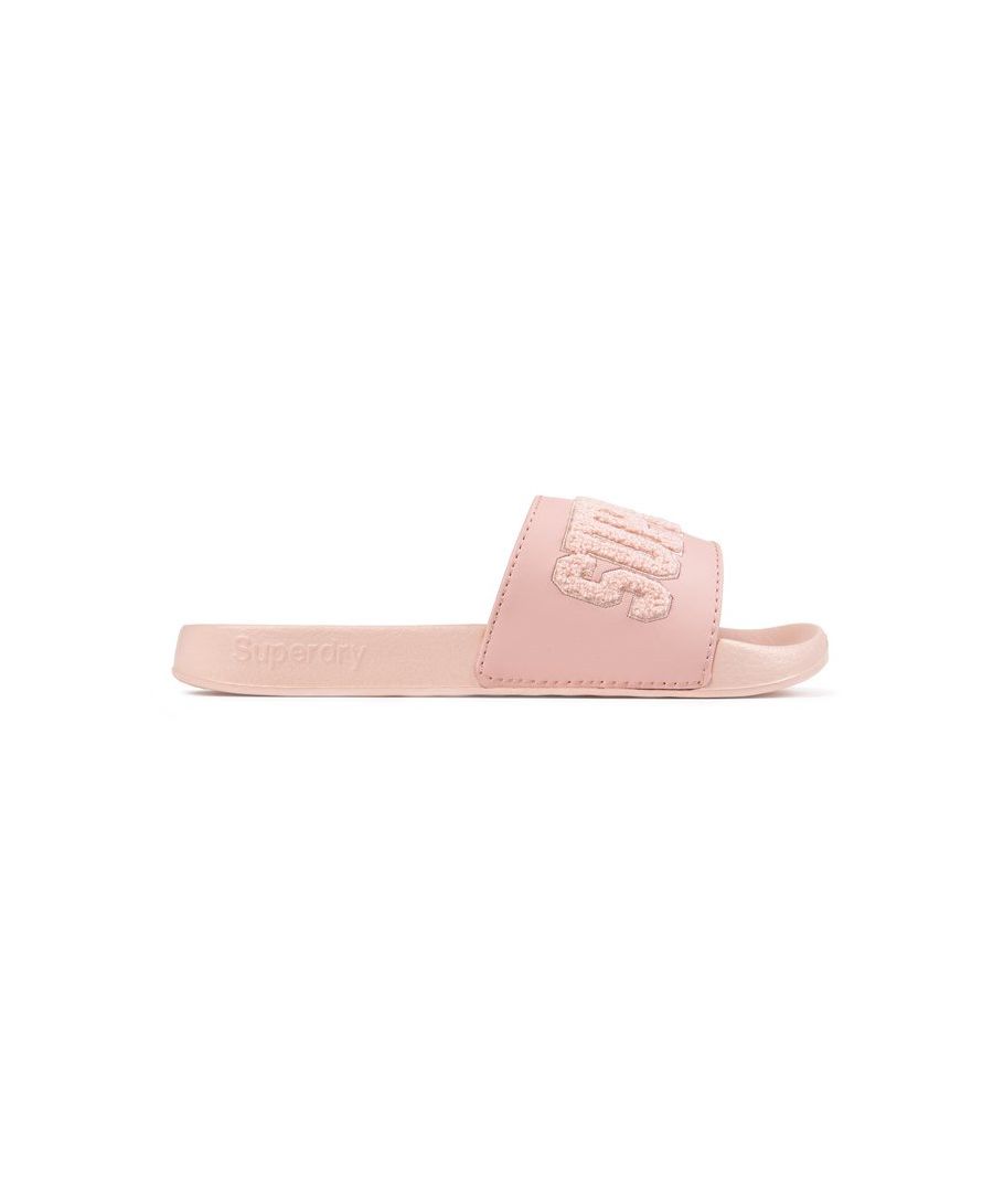 Women's Light Pink Superdry High Build Fluffy Logo Slip On Pool Sandals Featuring Moulded Soles And A Wide Synthetic Strap For Comfort, Finished With Embossed Superdry Branding On The Side And On Rubber Soles For Grip.