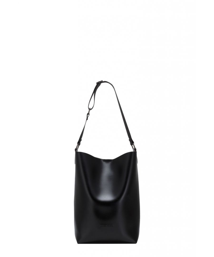 With its unique silhouette and minimalistic design the Leigh Bucket Style Shoulder Bag is bound to become your new staple bag of the season. This wardrobe favourite has ample storage space, giving you the ultimate choice to match any fit. Features: , Unlined smooth PU, Claudia Canova blind debossed logo, Soft and flexible shape, Removable inner pouch with zip fastening, Double front pocket detail, Mag-dot fastening Style Ref: 84314 BLACK